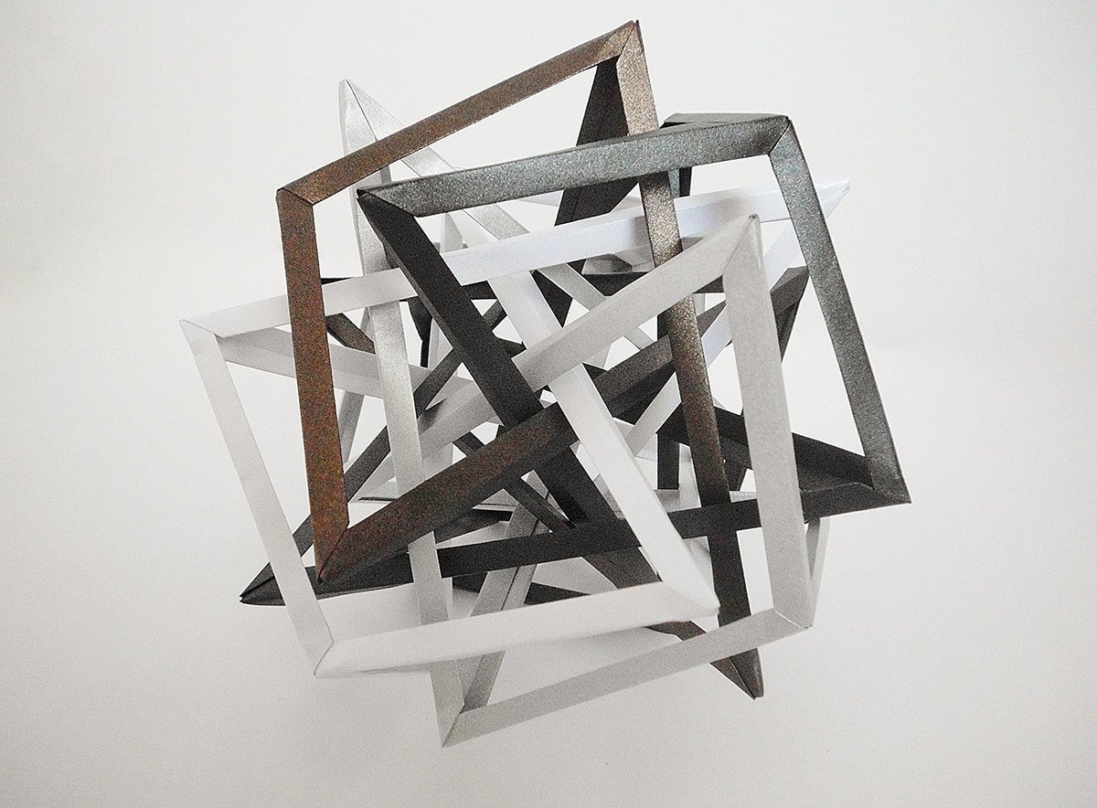 Four Interlocking Irregular Triaugmented Quasidiminished Hexahedra (Byriah Loper)