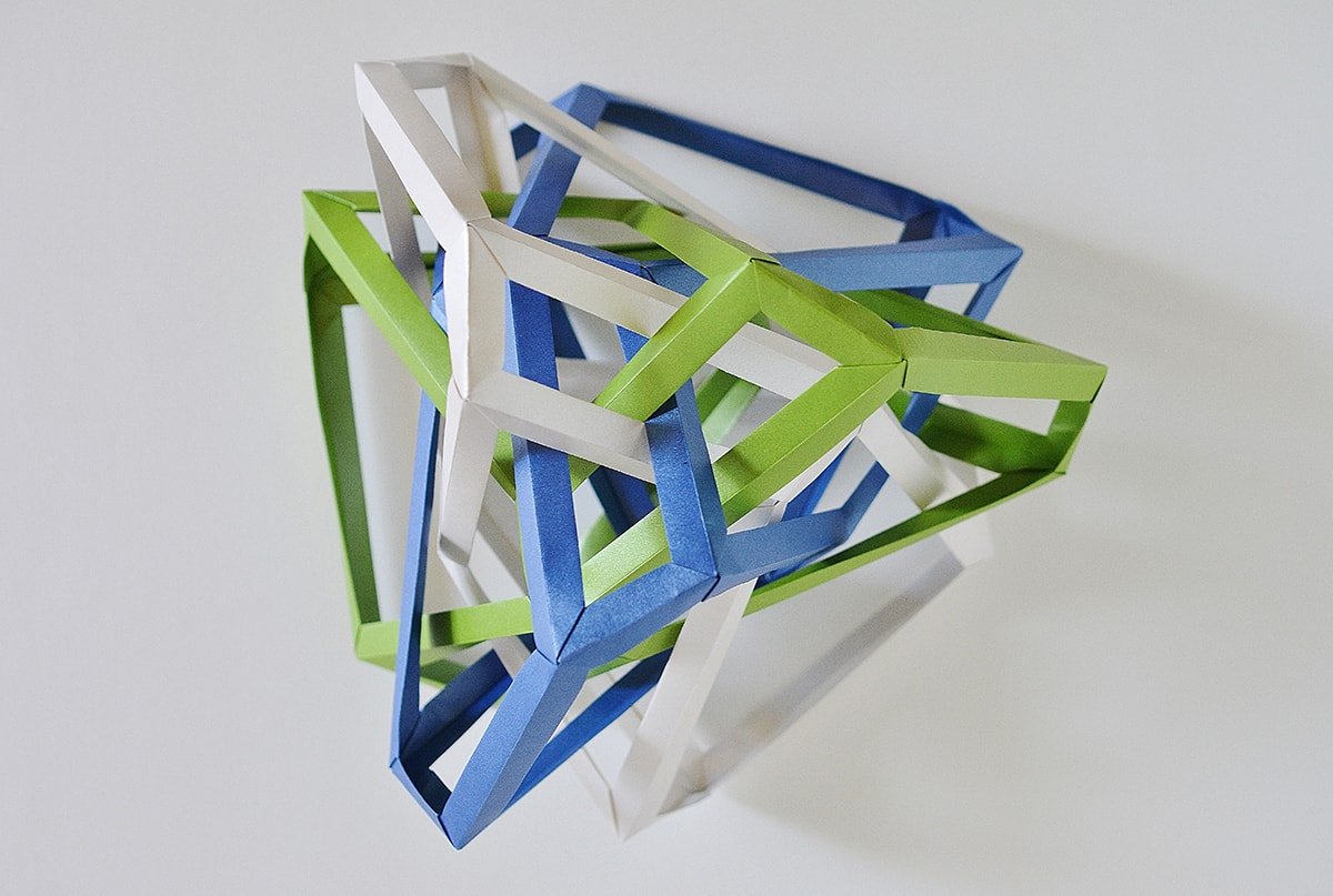 Three Interlocking Irregular Hyperboloidal Parabitruncated Gyrobifastigia